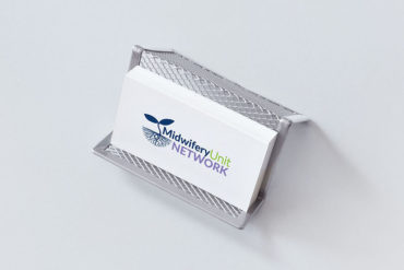 Business card mockup on a wire frame holder