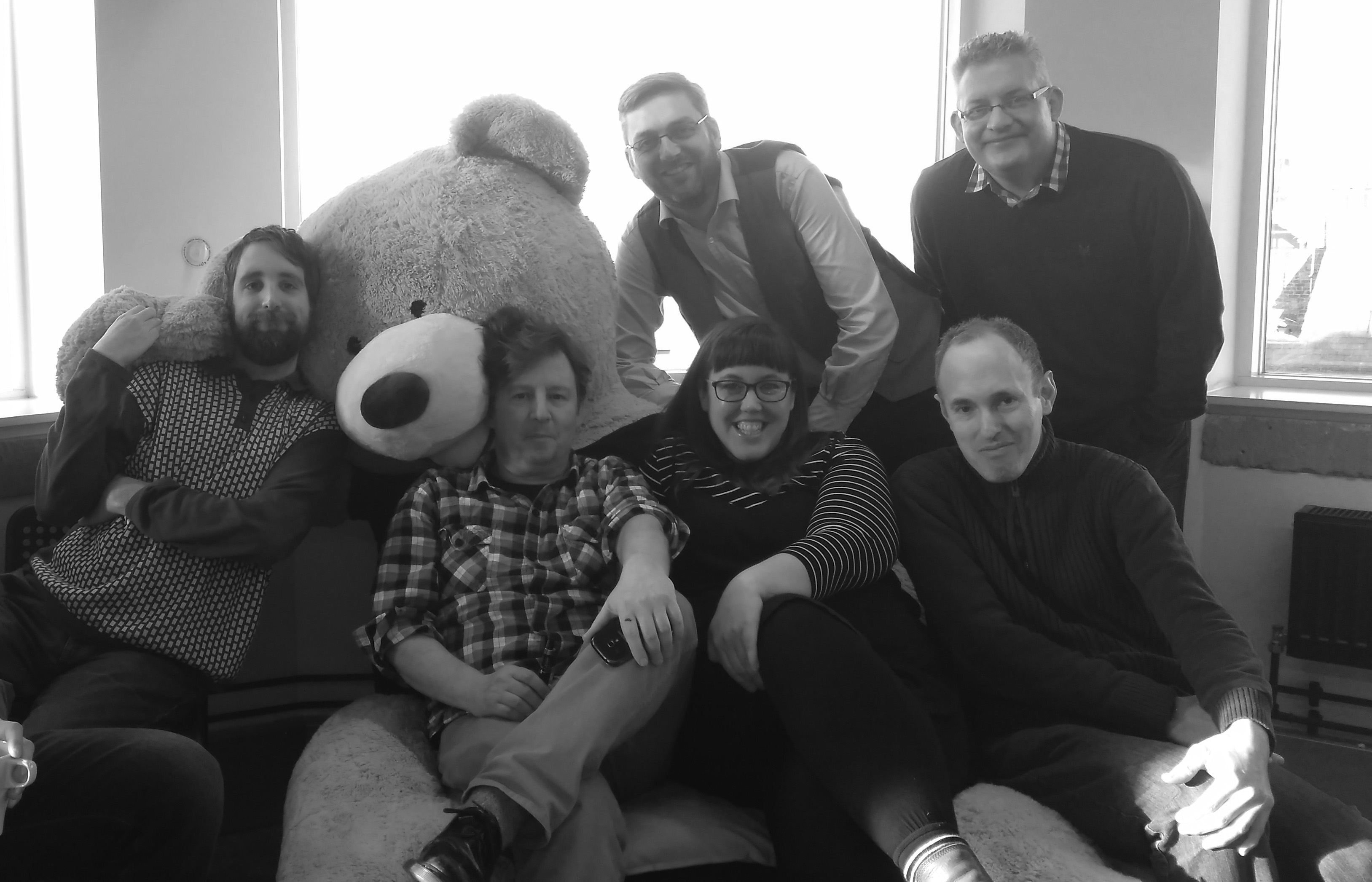 Jelly Liverpool attendees in front of giant bear. 