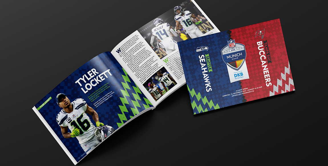 Mockup showing the front page of the Munich Seattle Seahawks vs Tampa Bay Buccaneers Event Programme on top of an open spread of the inside pages.