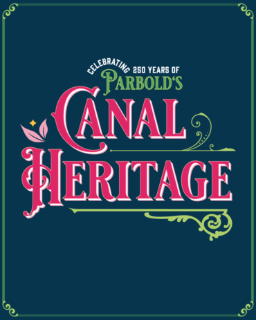 Vertical version of the Parbold Village Show heritage branding created by a graphic designer in Parbold, with ornate lettering and classic canal-boat motifs.