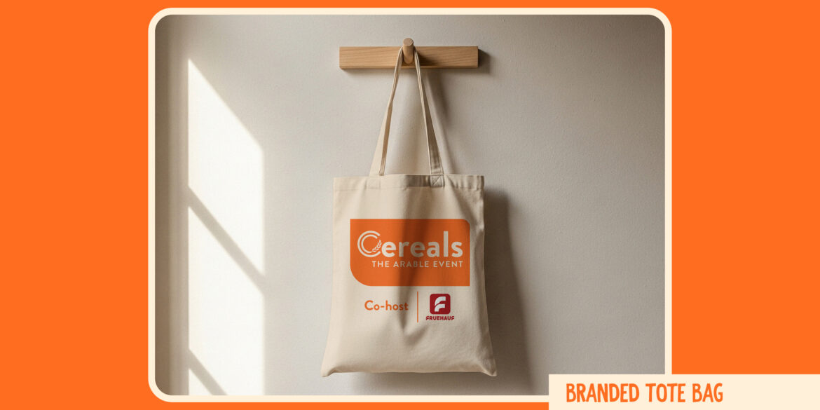 Branded tote bag design for Cereals – The Arable Event 2026, featuring the refreshed Cereals logo on a natural canvas bag, with co-host Fruehauf branding, displayed against an orange background.